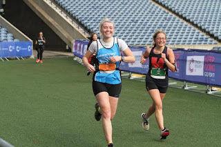 Me and Kez in Murrayfield Stadium running toward the finish.