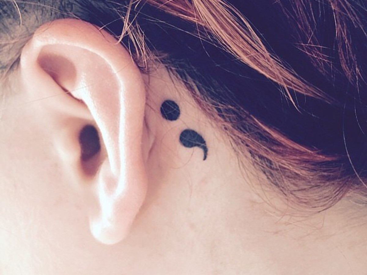 A semicolon tattoo has become a popular symbol of self-expression. The meaning behind it is as personal as the person wearing it.