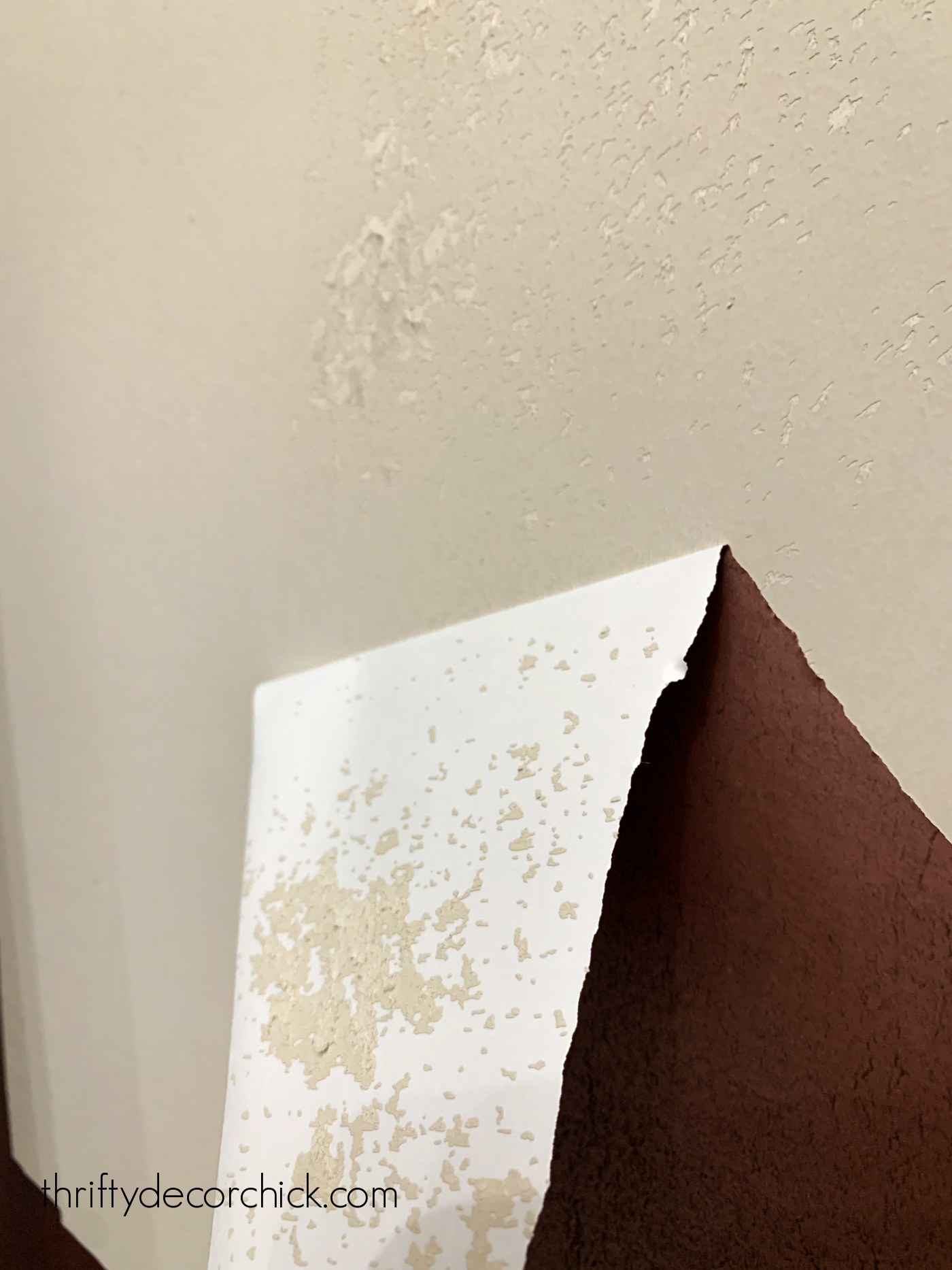 Peel and stick wallpaper drywall damage