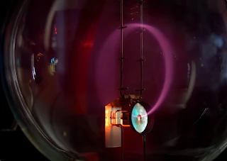 electron beam visible inside a Teltron tube