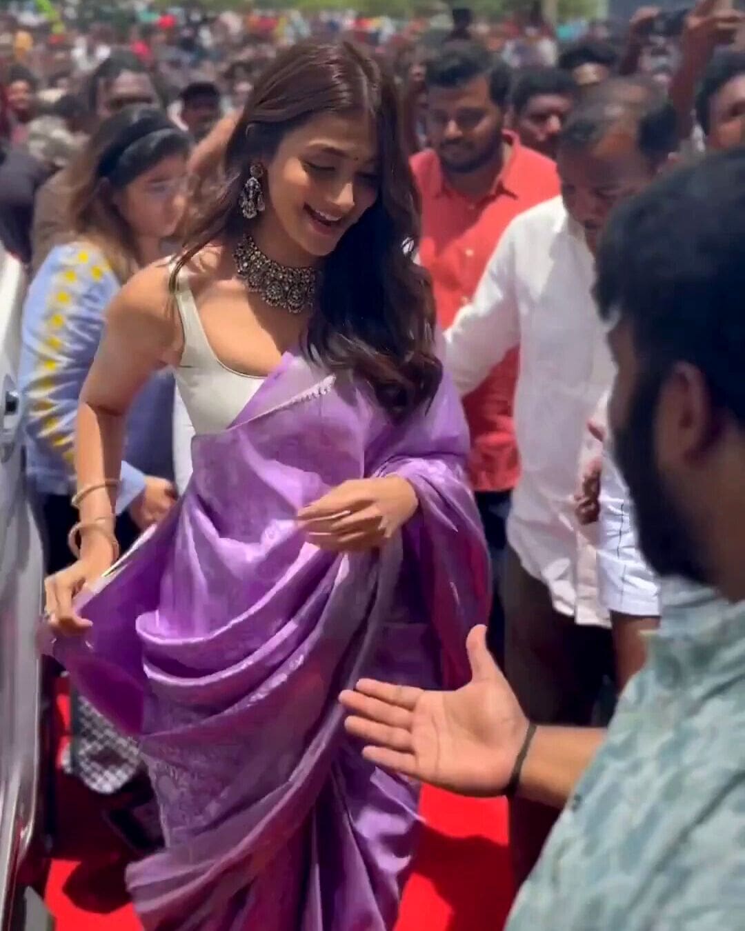 Pooja Hegde looks stunning in Purple Banarasi saree with strappy blouse