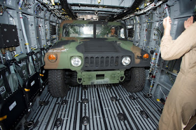 Marine Corps aircrew load a High Mobility Multipurpose Wheeled Vehicle on a CH53K King Stallion at Sikorskys Flight Center in West Palm Beach Florida in October 2016