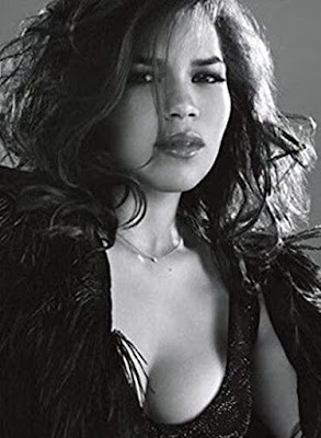 America Ferrera looking fluffed up and stylish in black and white