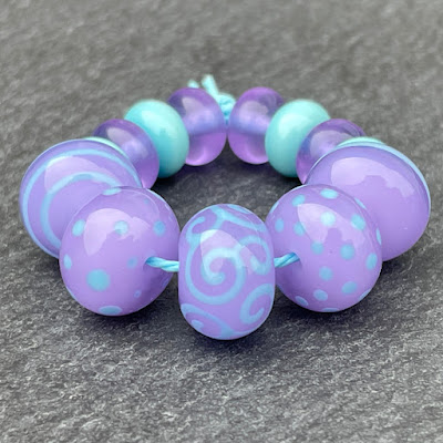 Handmade lampwork glass beads made with Creation is Messy Pizzazz