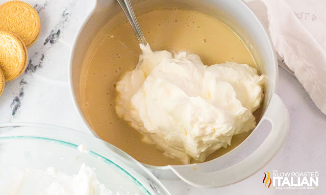 whipped cream in pot with condensed milk
