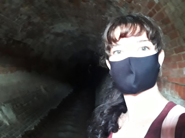 Underground tunnel tour selfie with COVID mask