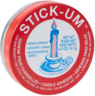 red can of Stick-Um Candle Adhesive