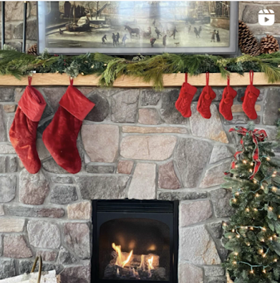 color photo stone fireplace red Christmas stockings