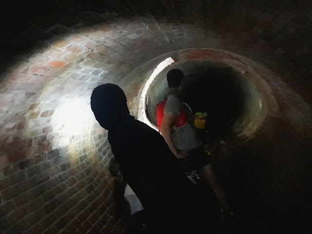 Tourists on underground tunnel tour in Cape Town