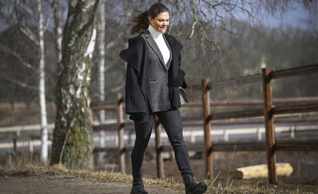 Crown Princess Victoria wore a black Annecy jacket by Toteme, and white Polana cashmere knit sweater by Andiata. Valentino boots