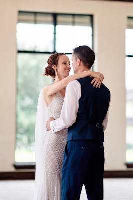 bride and groom dancing