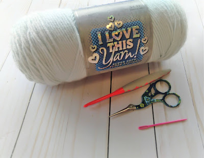 yarn, scissors, yarn needle, crochet hook size 5.00mm
