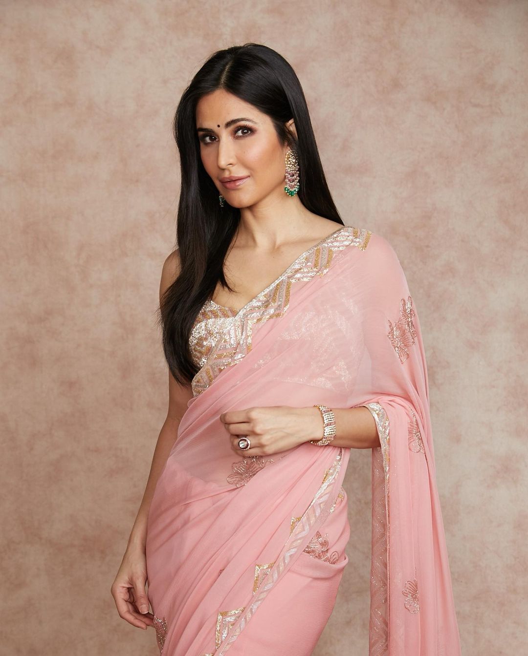 Katrina Kaif wearing a beautiful pink Chiffon saree with intricate embroidery and jewelry