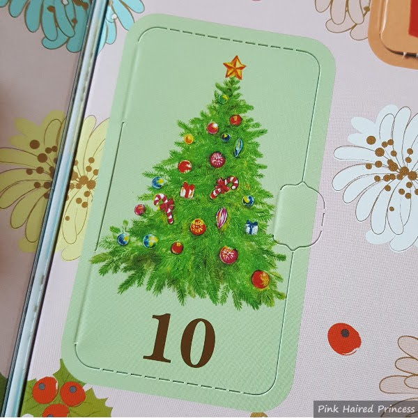 day 10 advent door with Christmas tree illustration