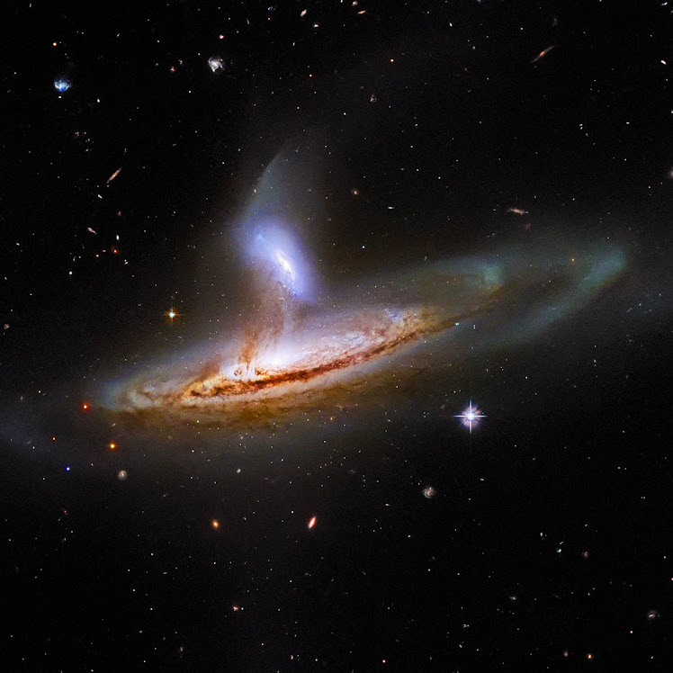 Hubble revela par de galáxias em interação de modo incrível
