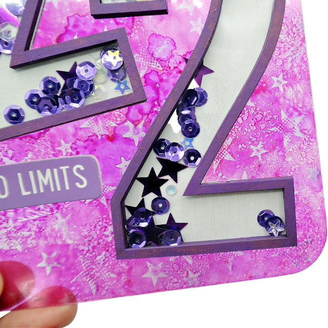 Chipboard Number Two Shaker Number Filled with Sequins and Gems on a Purple Acrylic Tag