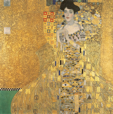 Opera di Klimt con sfondo dorato.