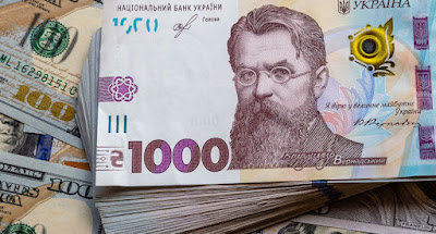 Гривна и украинские еврооблигации стремительно дешевеют