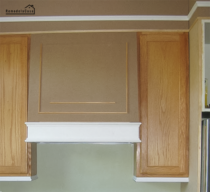 builders grade kitchen upgraded with moldings and paint