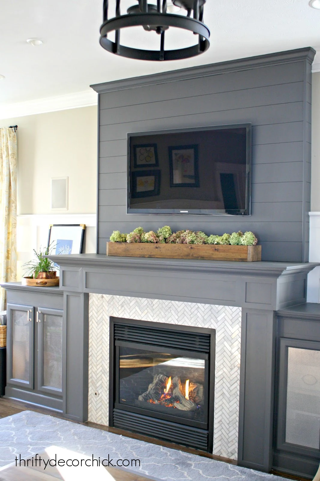 peppercorn gray and marble fireplace