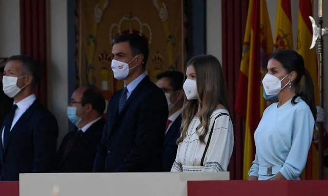 Infanta Sofia wore an embroidered eco-friendly viscose dress by Claudie Pierlot. Queen Letizia wore a light blue dress