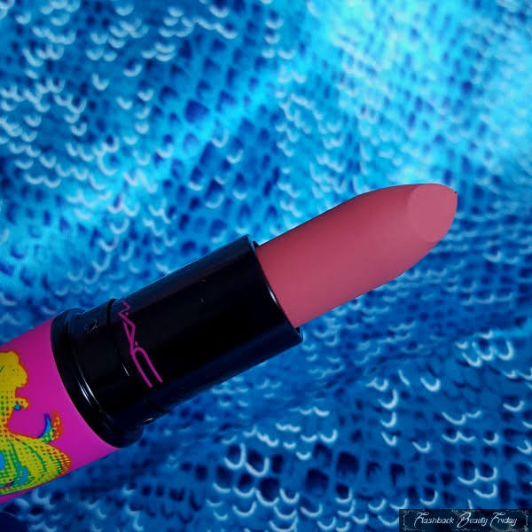close up of MAC Powder Kiss Lipstick in Brickthrough in limited edition fish packaging