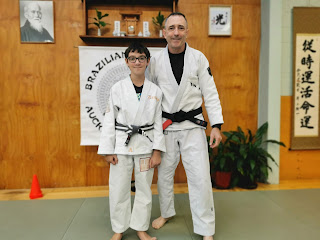 Professor Adam Evans with Liam auckland kids bjj