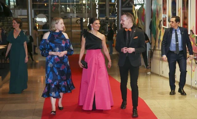 Crown Princess Victoria wore a new pink skirt from H&M Innovation Circular Design Story, and black one-shoulder silk top