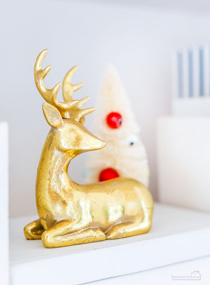 gold reindeer and little bottlebrush tree