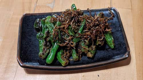 Fried shishito peppers with baby dried sardines