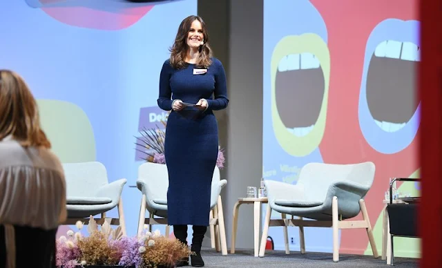 Princess Sofia wore a double breasted checked coat, grey leather cuffs by 2nd Day. Navy sweater midi dress