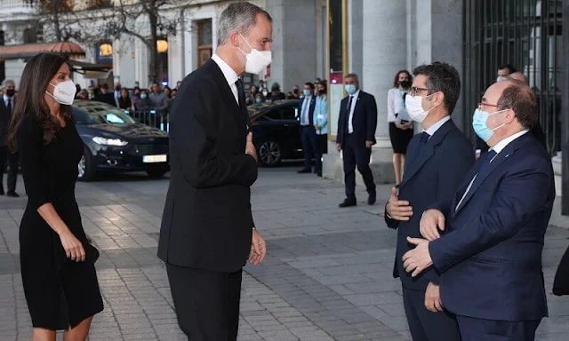 Queen Letizia wore a ruffle side dress by Emporio Armani