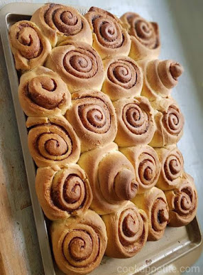 These easy cinnamon rolls made from scratch are beginner-friendly and perfect for breakfast and brunch.  This cinnamon roll recipe is classic, makes perfect home-style cinnamon rolls. These dinner rolls are fluffy and soft. They can be enjoyed with a glaze or plan. If you love baking with yeast then you'll love these rolls.. Don't be intimidated though, this is a simple rolls recipe that can be made even by a beginner.