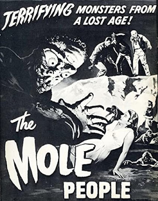 50s Style monster movie poster with a monster going after a screaming beautiful woman with the caption Terrifying Monsters From A Lost Age The Mole People