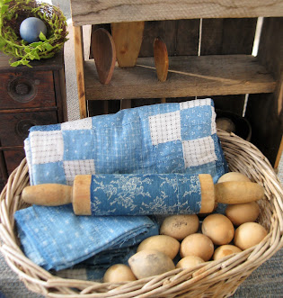 early rolling pin with 1890s blue calico