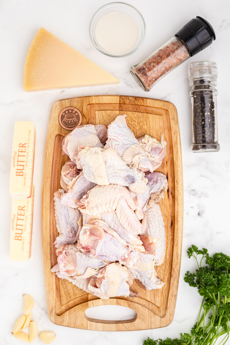 Overhead photo of the ingredients needed to make Crispy Garlic Parmesan Chicken Wings.