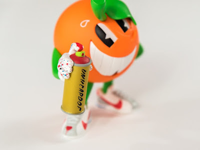 UNHEARDOF Edition Atomik Orange Vinyl Figure by Atomik x UVD Toys