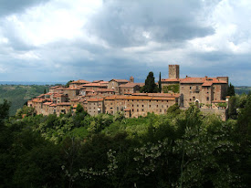 The medieval hilltop village of Parrano, where Dossena helped restore the castle
