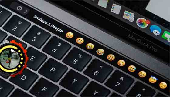 زر Emoji في MacBook Touch Bar