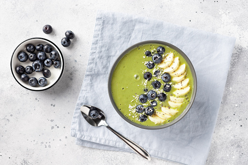 Super Green Mango Smoothie Bowl With Hemp Seeds.