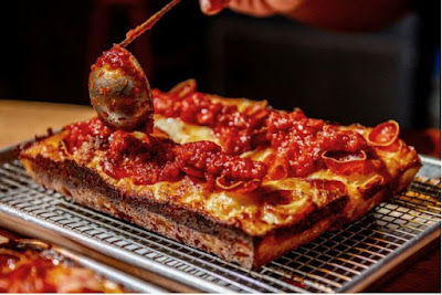 WHAT STYLE PIZZA IS THIS?