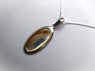 Silver oval keepsake pendant for hair or ashes