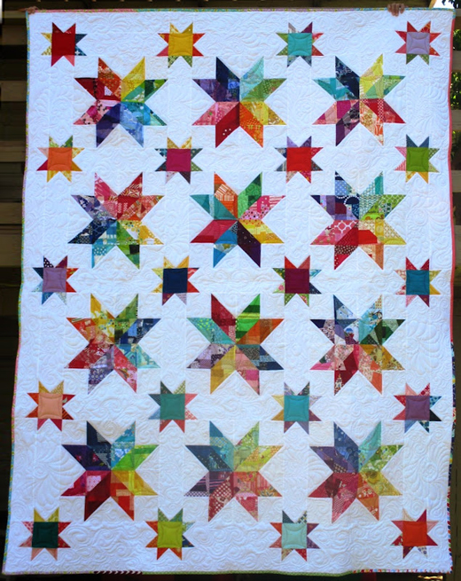 Scrappy Rainbow Star Quilt designed by Melissa Corry of Happy Quilting Melissa