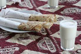 Does eating milk and roti at night give more health benefits or are there disadvantages too?