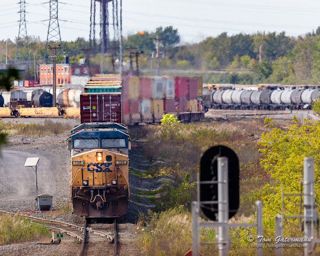 Q212-01 is eastbound on the Departure Lead, nearing CP282 on the eastern side of DeWitt Yard.