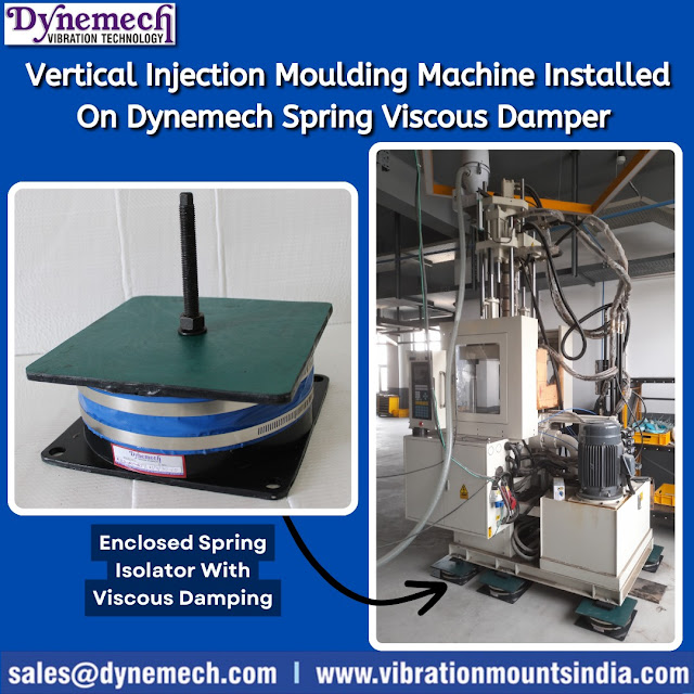 An industrial Vertical Injection Moulding Machine installed with Dynemech’s Spring Viscous Dampers, ensuring a stable, vibration-free operation. The dampers provide enhanced precision, reduced defects, and improved machine longevity, making them ideal for high-performance manufacturing environments.