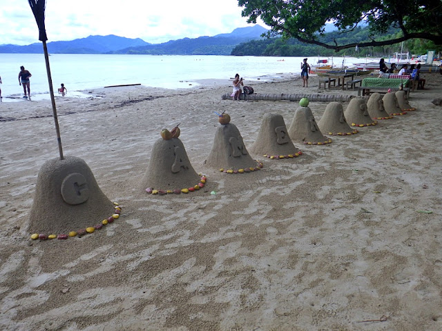 sandcatles for camera tricks at Sabang Beach in Puerto Princesa