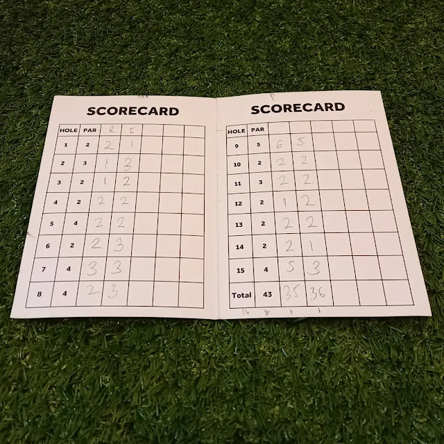 A minigolf scorecard from Glo Golf Peterborough