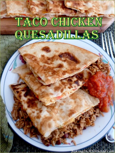 Taco Chicken Quesadillas, taco flavored chicken, vegetables and cheese are pan grilled between flour tortillas for a flavorful lunch, dinner, or snack. | Recipe developed by www.BakingInATornado.com | #recipe #dinner