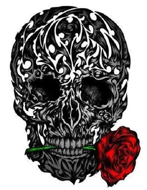 human skull with rose flower